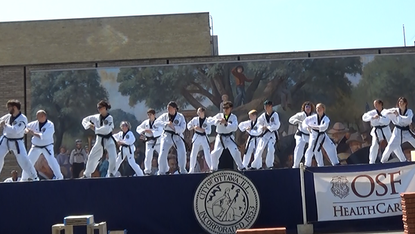 Black belts perform one of their forms during the annual Riverfest.