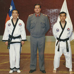 Grand Master Yoon and Master Duque stand next to each other