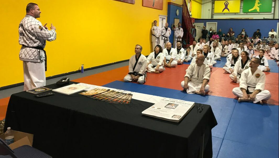 GM Rhoades instructs black belts on hapkido technique